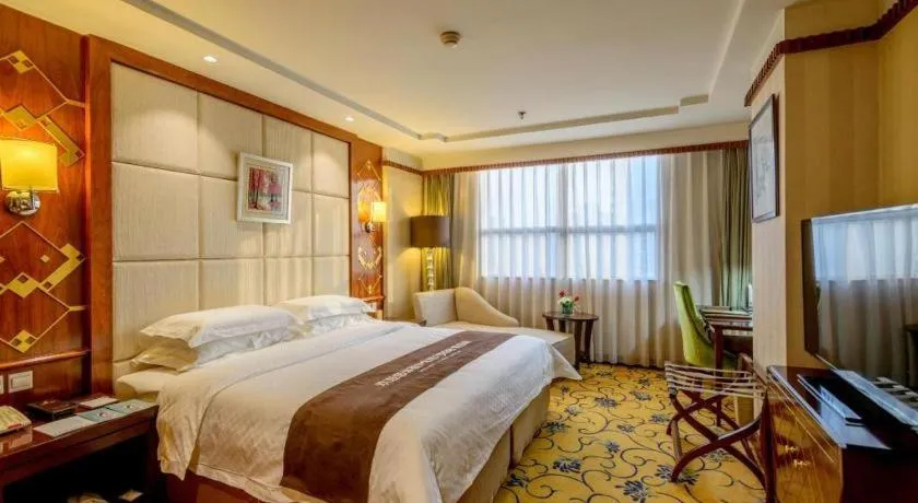 Bed in Dahe Jinjiang Hotel