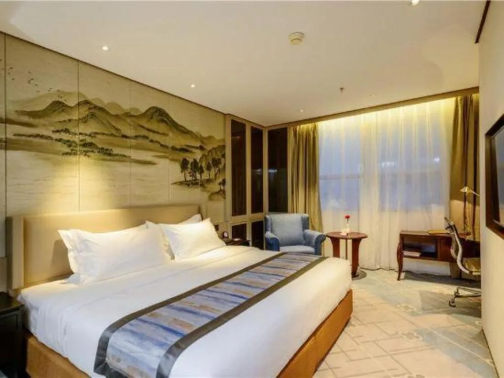 Bed in Dahe Jinjiang Hotel