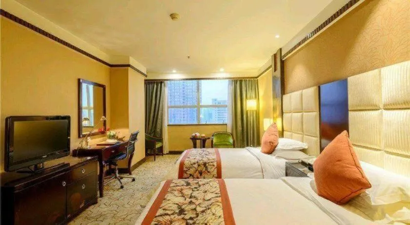 Bed in Dahe Jinjiang Hotel