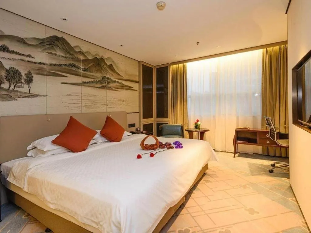 Bed in Dahe Jinjiang Hotel