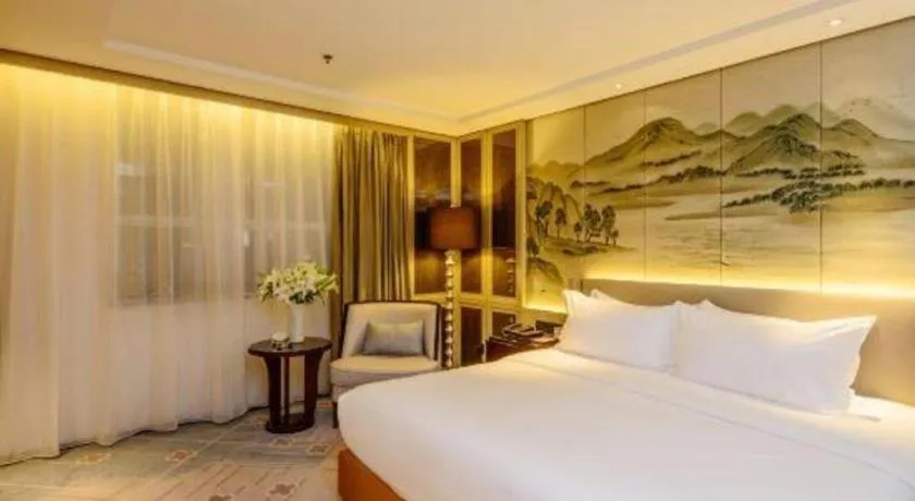 Bed in Dahe Jinjiang Hotel