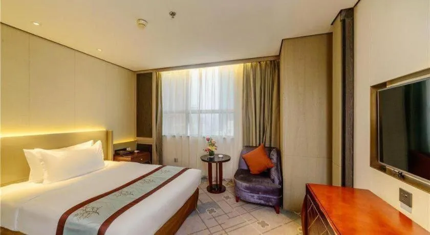 Bed in Dahe Jinjiang Hotel