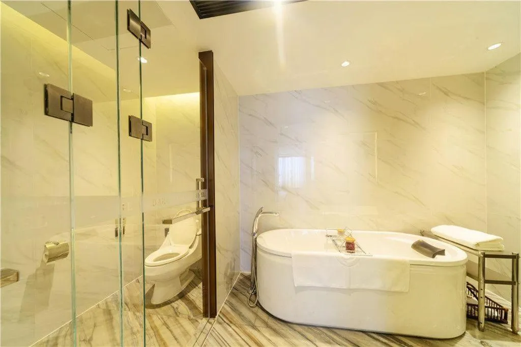 Bed in Dahe Jinjiang Hotel