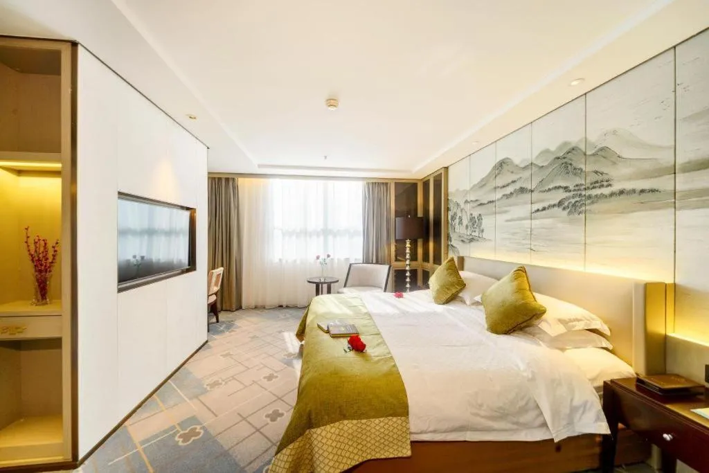 Bed in Dahe Jinjiang Hotel