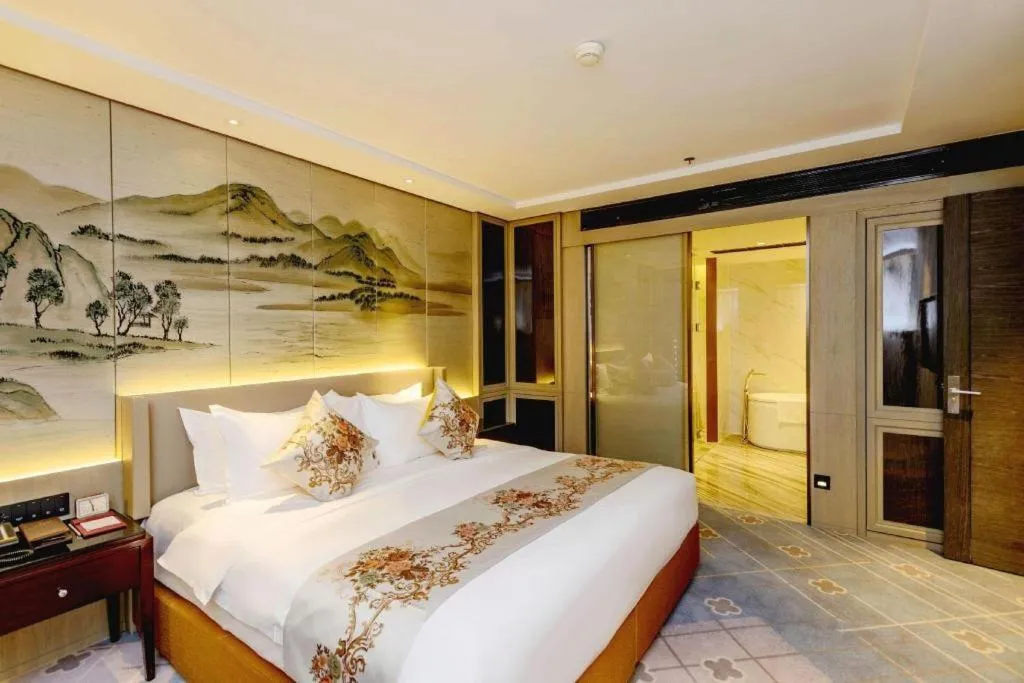 Bed in Dahe Jinjiang Hotel