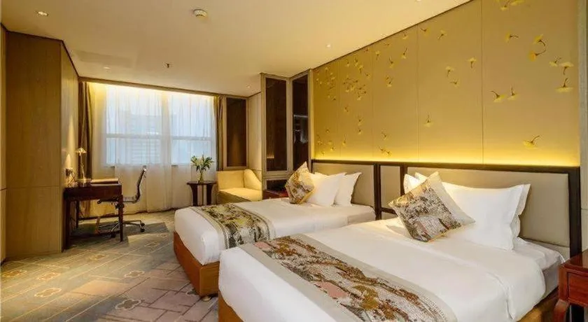 Bed in Dahe Jinjiang Hotel