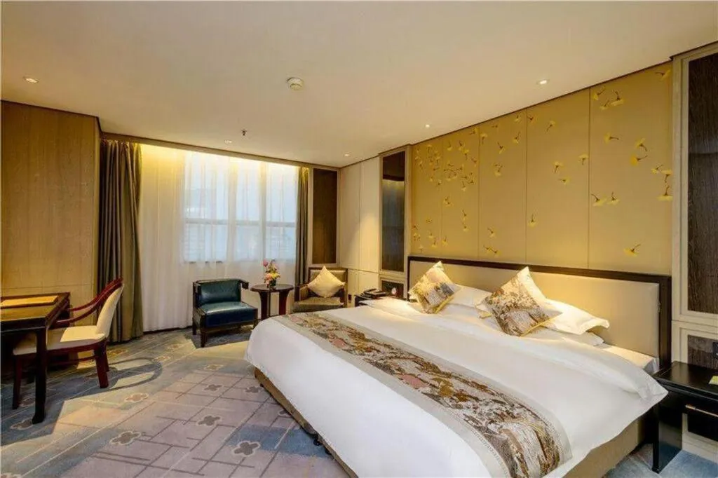 Bed in Dahe Jinjiang Hotel