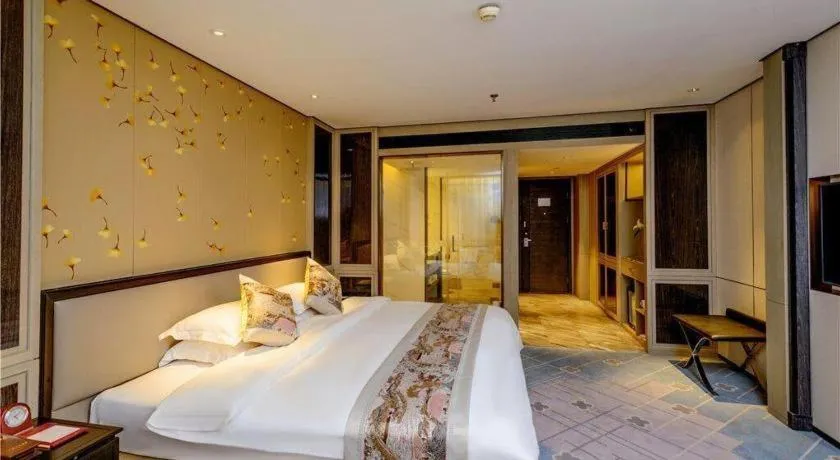 Bed in Dahe Jinjiang Hotel