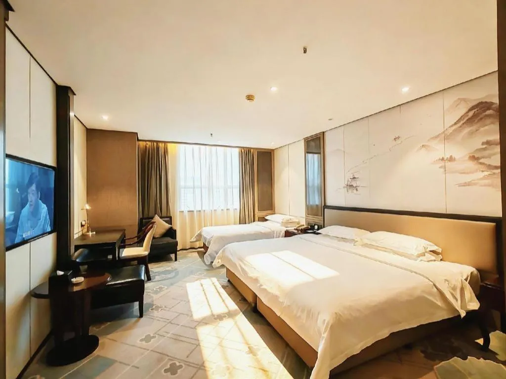 Bed in Dahe Jinjiang Hotel