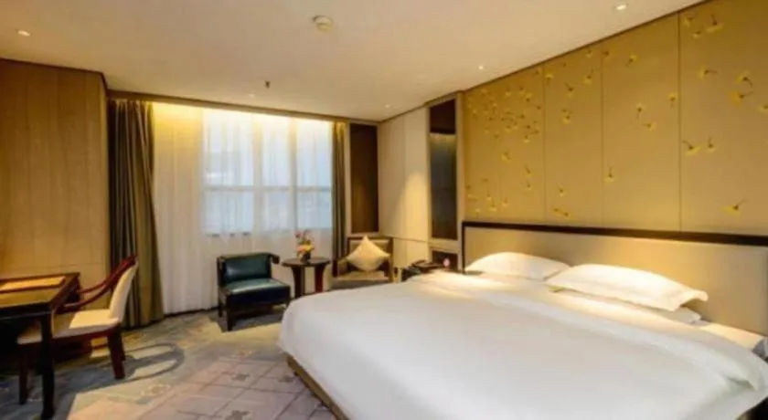 Bed in Dahe Jinjiang Hotel