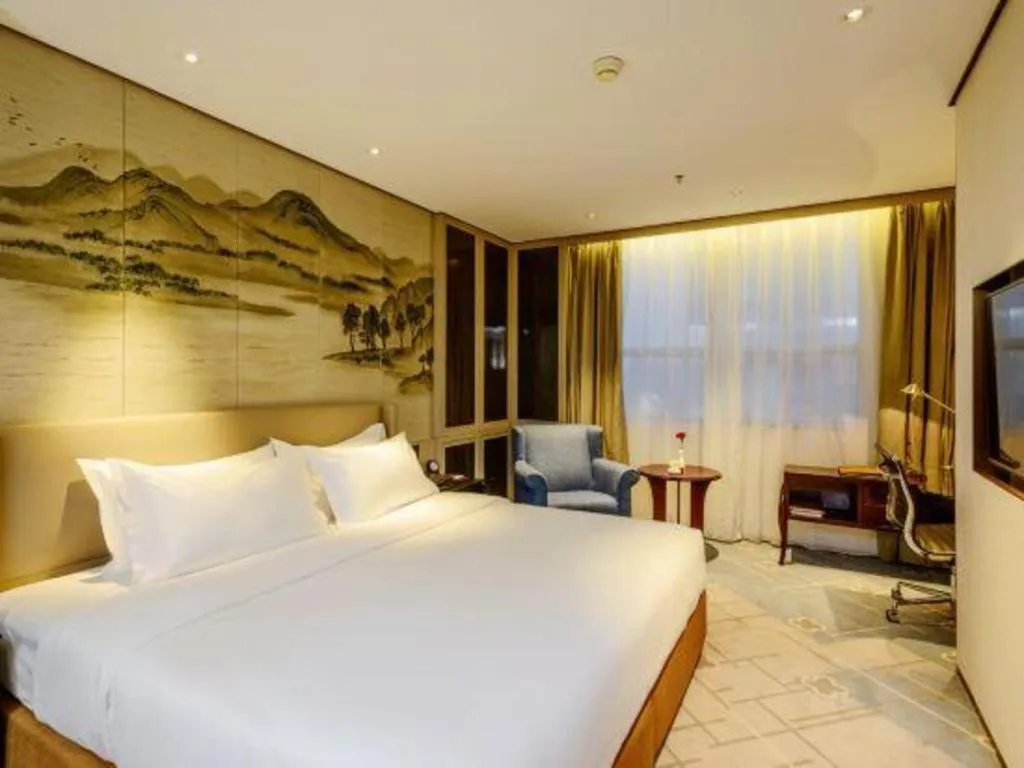 Bed in Dahe Jinjiang Hotel