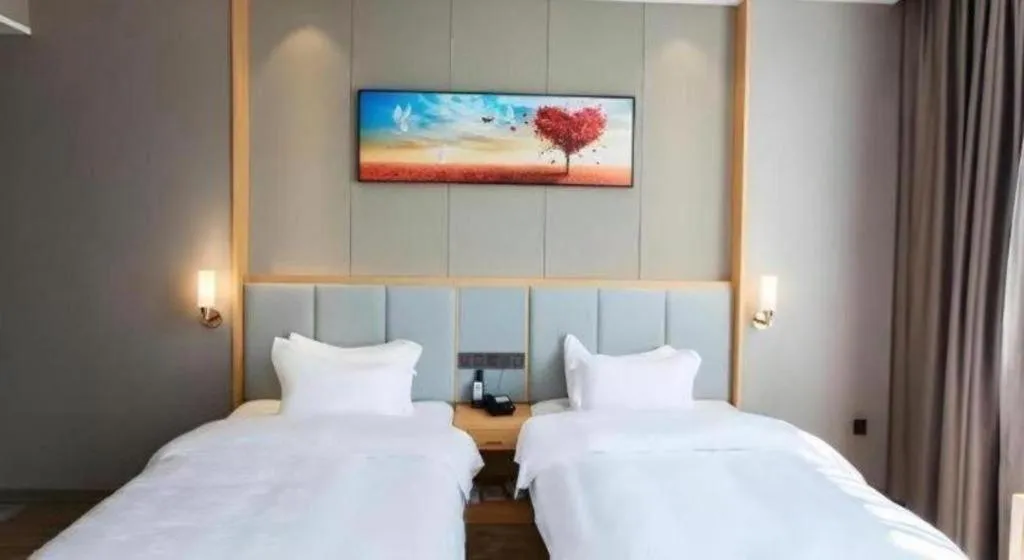 Bed in GreenTree Eastern Hotel Yunnan Shangri-La Yangtang Road