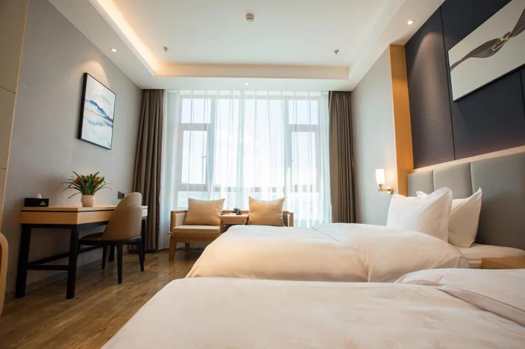 Bed in GreenTree Eastern Hotel Yunnan Shangri-La Yangtang Road