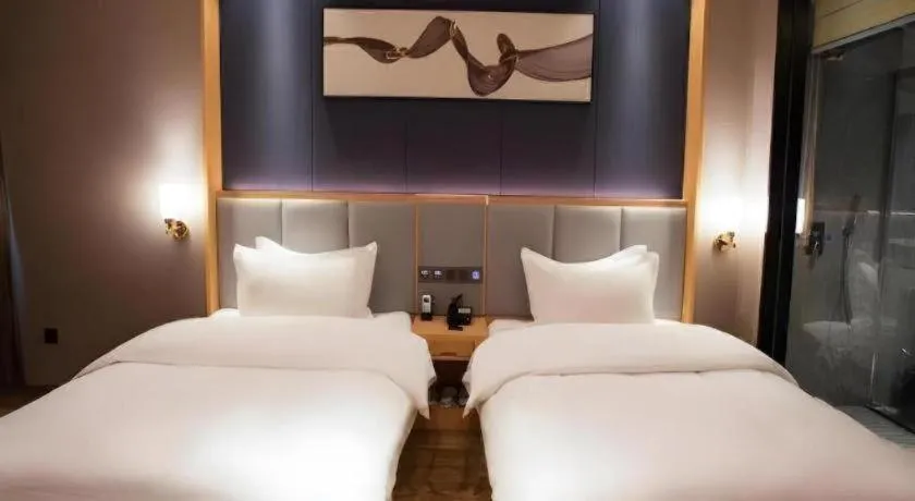 Bed in GreenTree Eastern Hotel Yunnan Shangri-La Yangtang Road