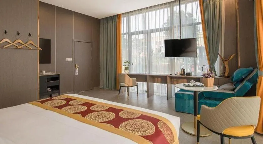 Bed in Shell Hotel Nanyang High-Speed Railway Station Jiangying Airport Huayaocheng