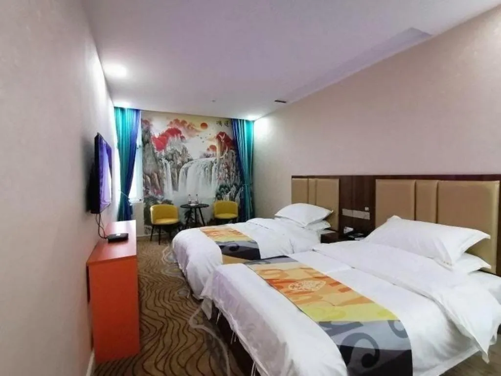 Bed in Shell Hotel Nanyang High-Speed Railway Station Jiangying Airport Huayaocheng