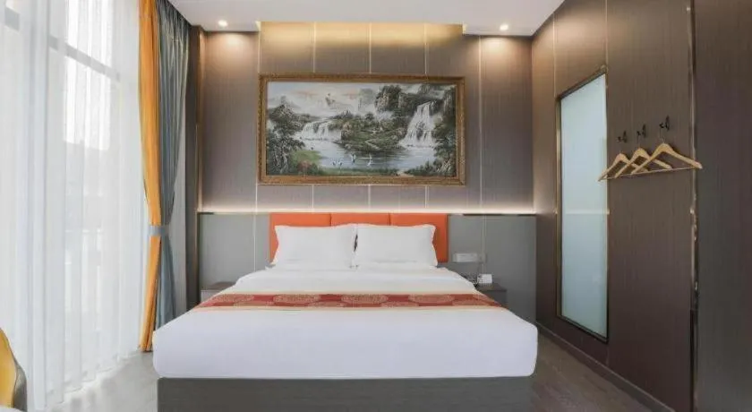 Bed in Shell Hotel Nanyang High-Speed Railway Station Jiangying Airport Huayaocheng