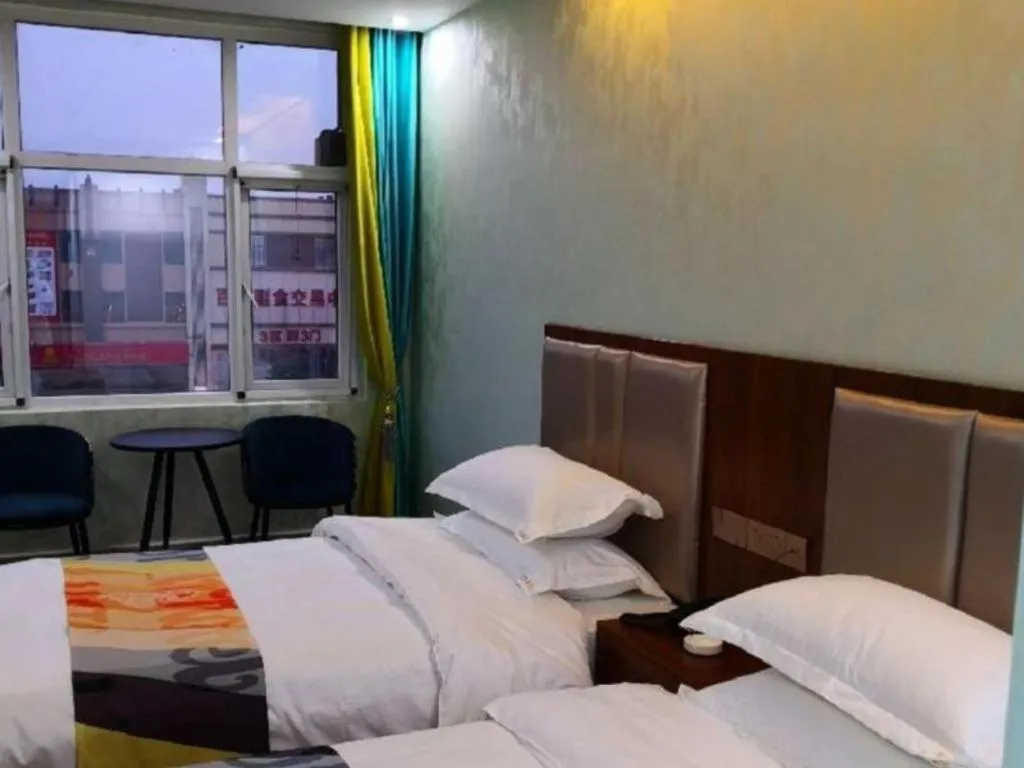 Bed in Shell Hotel Nanyang High-Speed Railway Station Jiangying Airport Huayaocheng