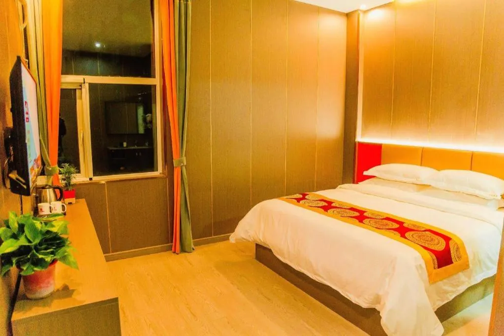 Bed in Shell Hotel Nanyang High-Speed Railway Station Jiangying Airport Huayaocheng
