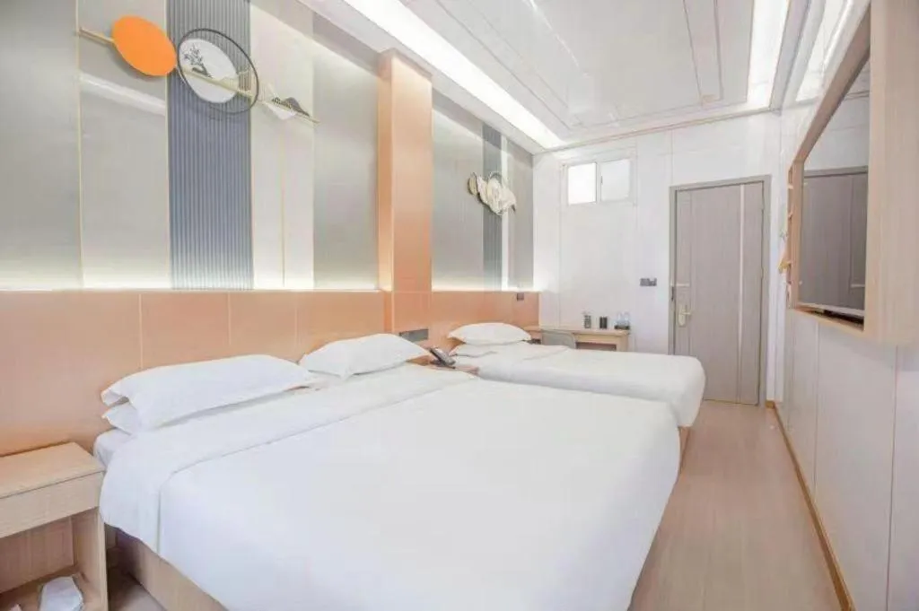 Bed in Shell Hotel Nanyang High-Speed Railway Station Jiangying Airport Huayaocheng