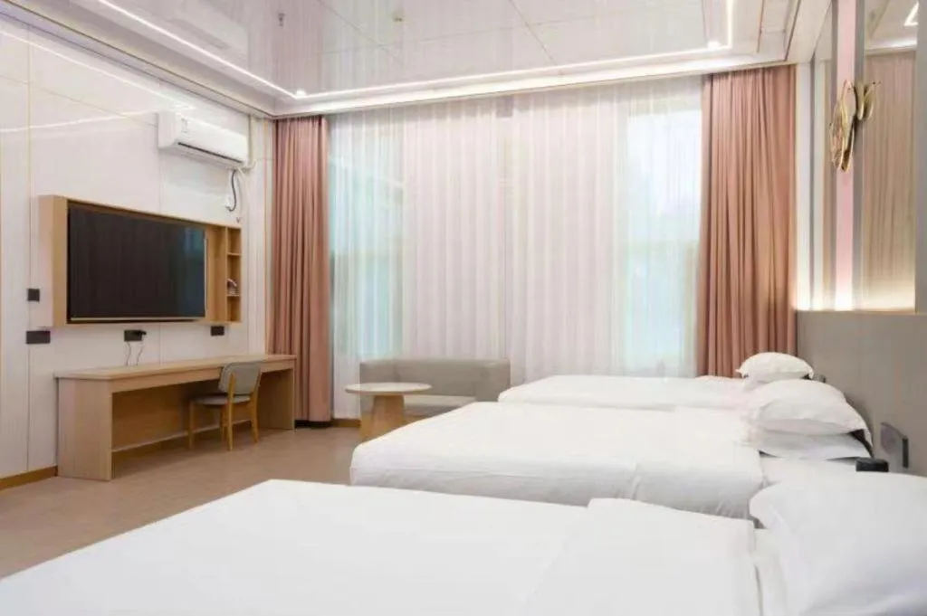 Bed in Shell Hotel Nanyang High-Speed Railway Station Jiangying Airport Huayaocheng
