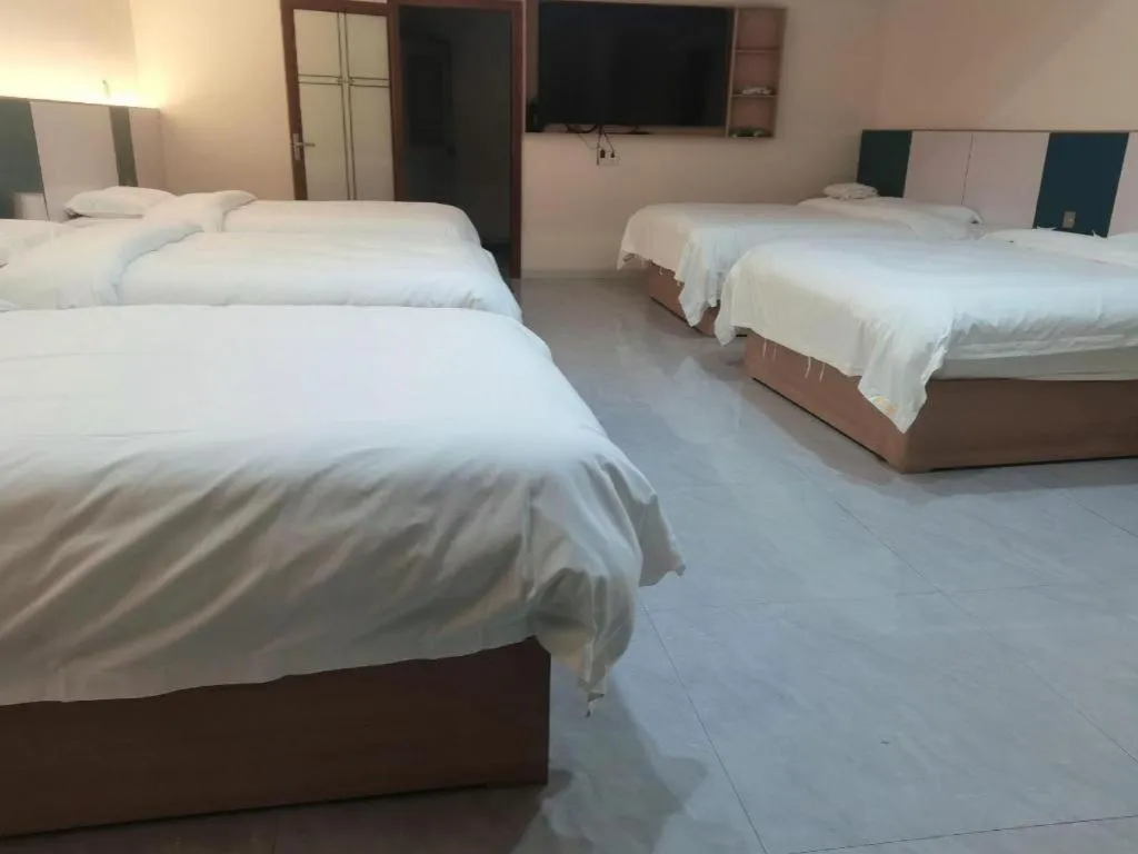Bed in Shell Hotel Nanyang High-Speed Railway Station Jiangying Airport Huayaocheng