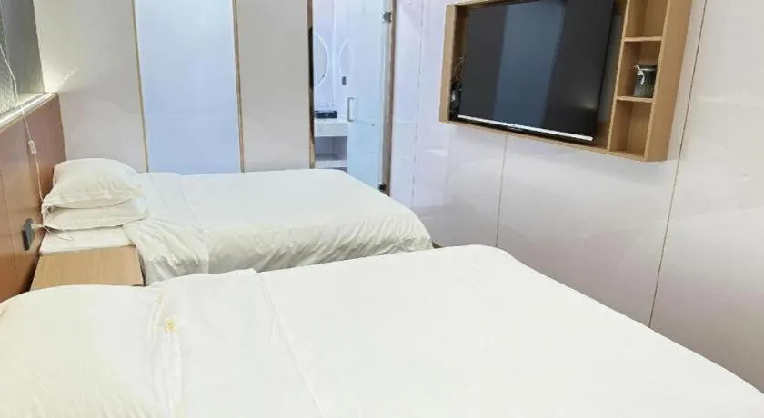 Bed in Shell Hotel Nanyang High-Speed Railway Station Jiangying Airport Huayaocheng