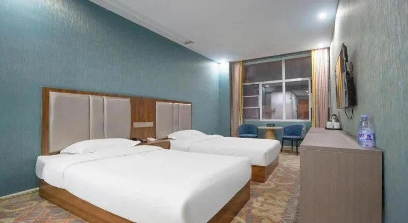 Bed in Shell Hotel Nanyang High-Speed Railway Station Jiangying Airport Huayaocheng