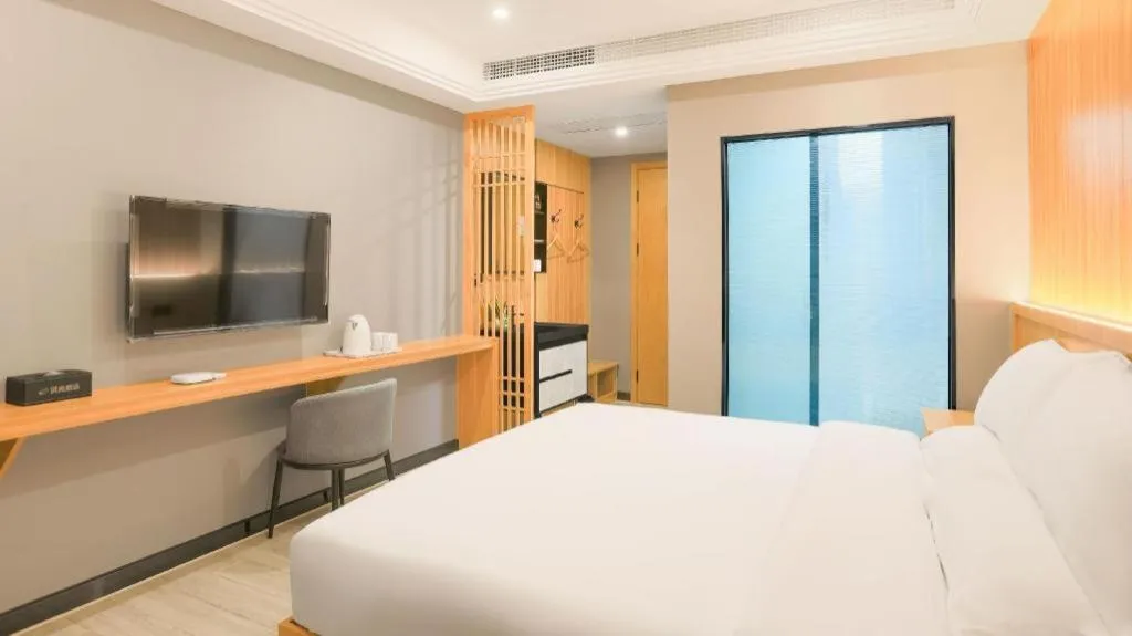 Bed in Shell Hotel Nanyang High-Speed Railway Station Jiangying Airport Huayaocheng
