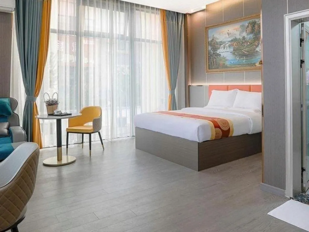 Bed in Shell Hotel Nanyang High-Speed Railway Station Jiangying Airport Huayaocheng