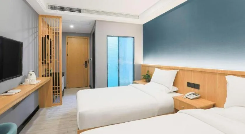 Bed in Shell Hotel Nanyang High-Speed Railway Station Jiangying Airport Huayaocheng