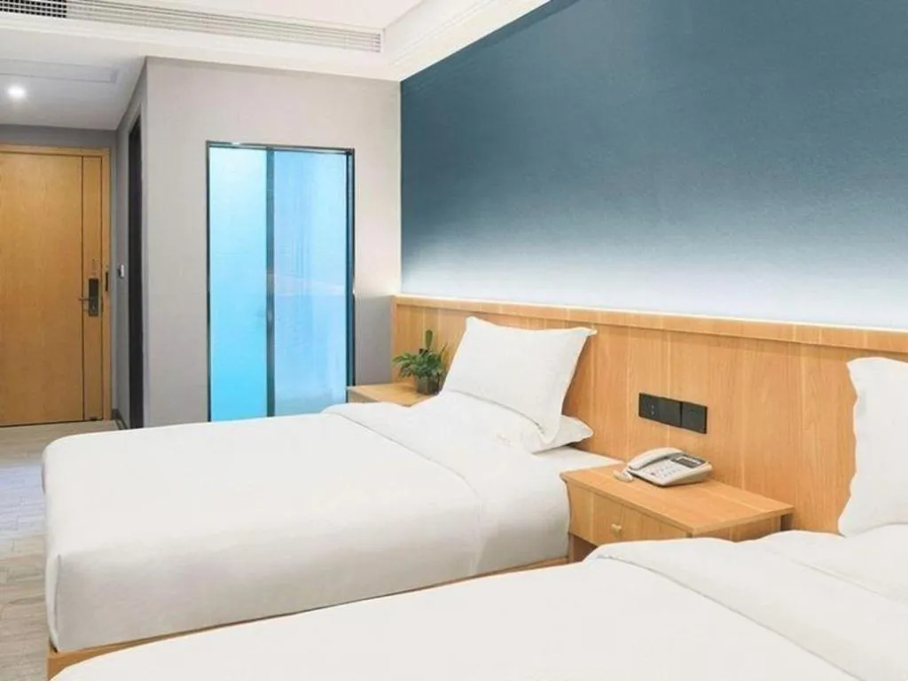Bed in Shell Hotel Nanyang High-Speed Railway Station Jiangying Airport Huayaocheng