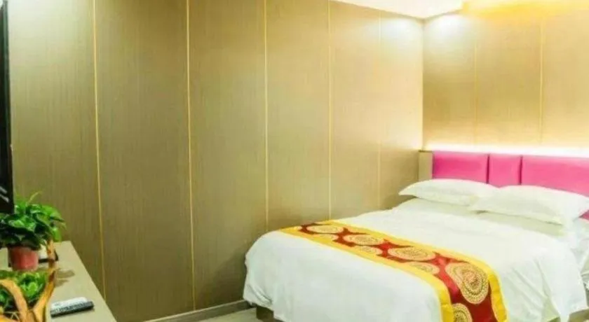 Bed in Shell Hotel Nanyang High-Speed Railway Station Jiangying Airport Huayaocheng