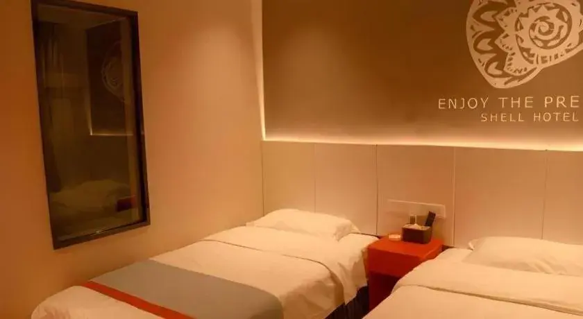 Bed in Shell Hotel Hebi Qi County Qihe Road Bed in Shell Hotel Hebi Qi County Qihe Road