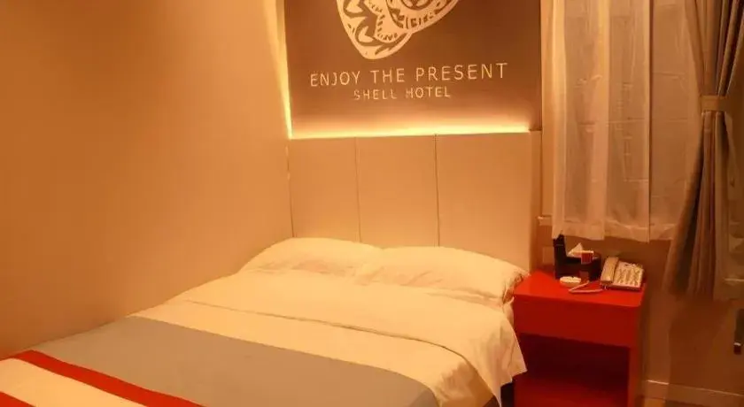 Bed in Shell Hotel Hebi Qi County Qihe Road Bed in Shell Hotel Hebi Qi County Qihe Road