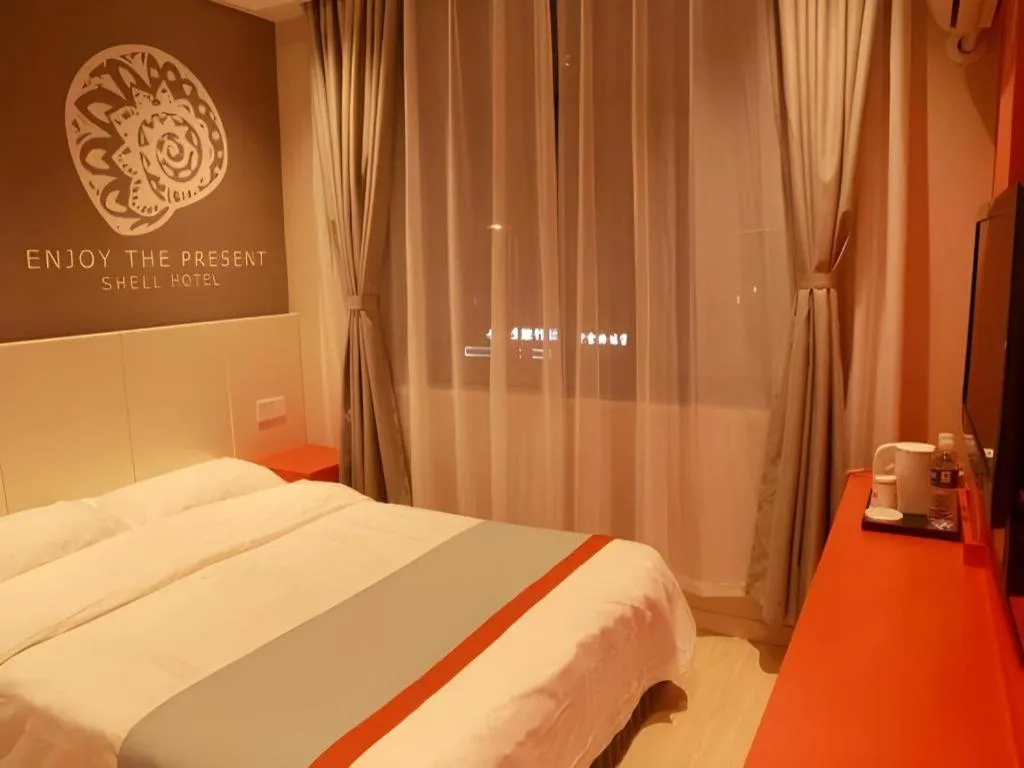 Bed in Shell Hotel Hebi Qi County Qihe Road