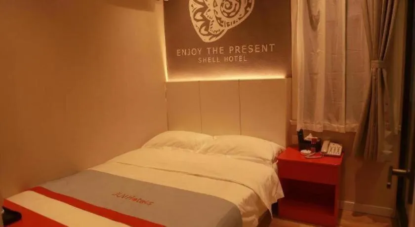 Bed in Shell Hotel Hebi Qi County Qihe Road