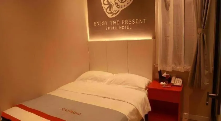 Bed in Shell Hotel Hebi Qi County Qihe Road