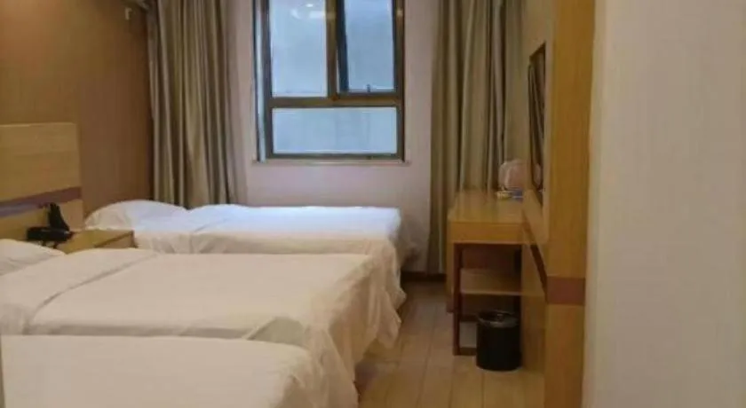 Bed in Shell Hotel Beijing Fangshan District Chengguan Metro Station