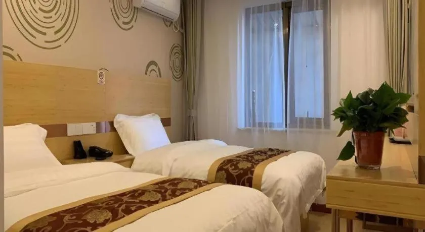 Bed in Shell Hotel Beijing Fangshan District Chengguan Metro Station