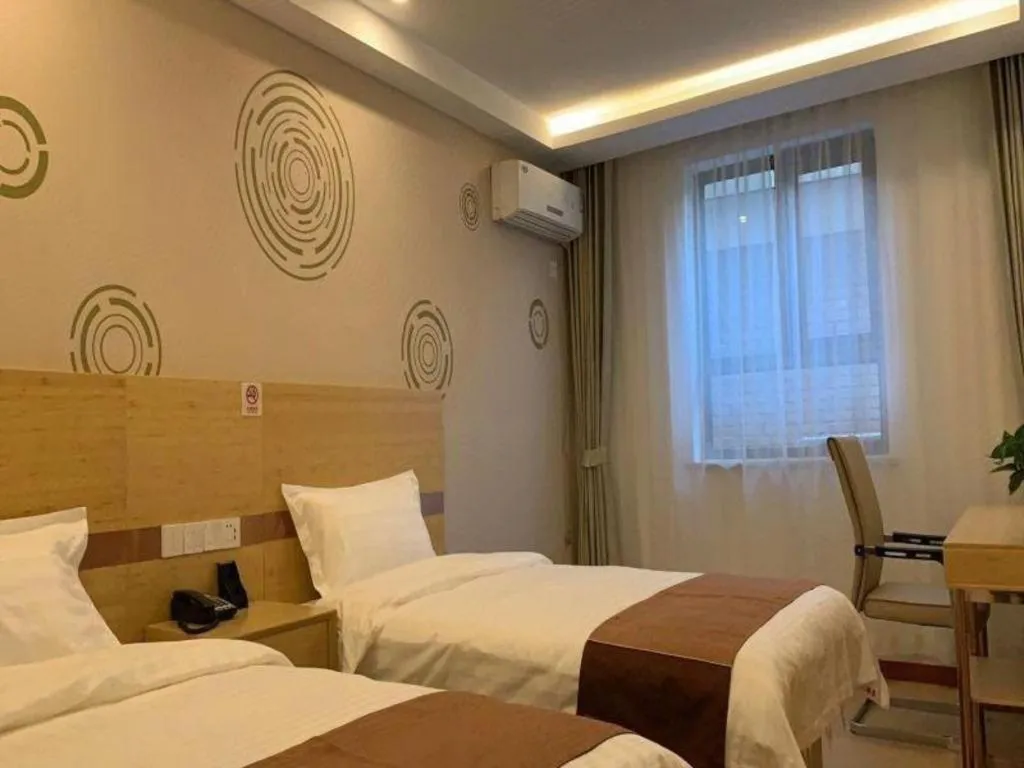 Bed in Shell Hotel Beijing Fangshan District Chengguan Metro Station