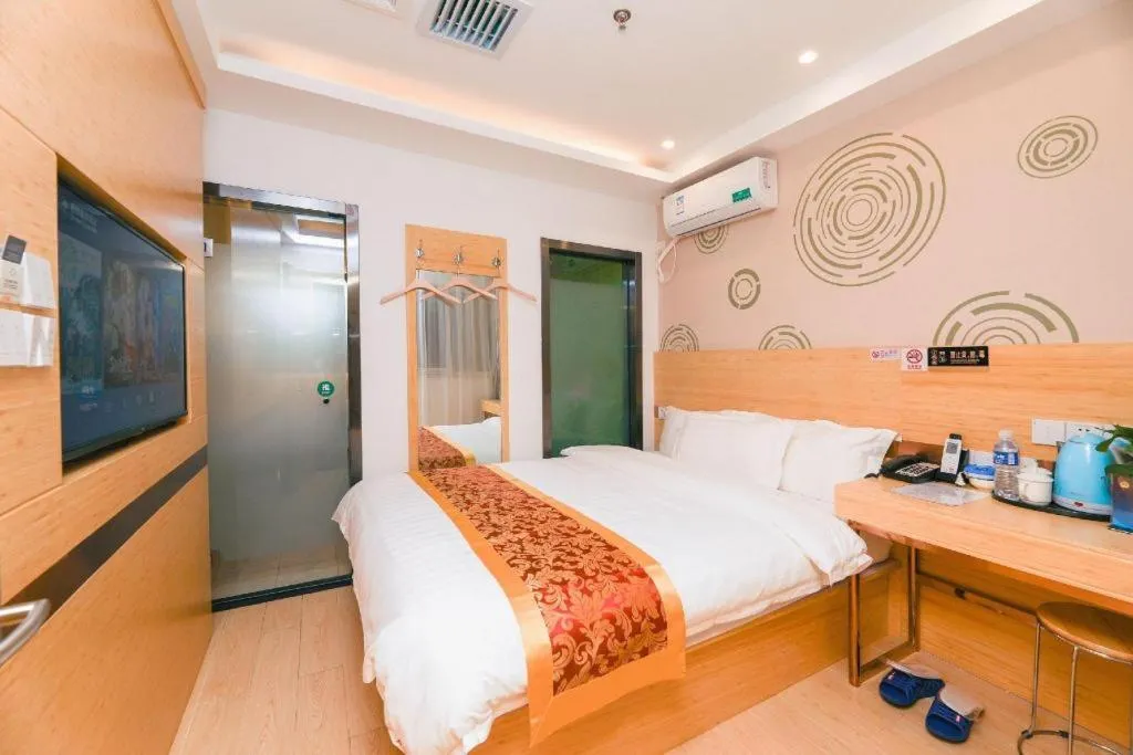 Bed in Shell Hotel Beijing Fangshan District Chengguan Metro Station