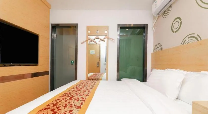 Bed in Shell Hotel Beijing Fangshan District Chengguan Metro Station