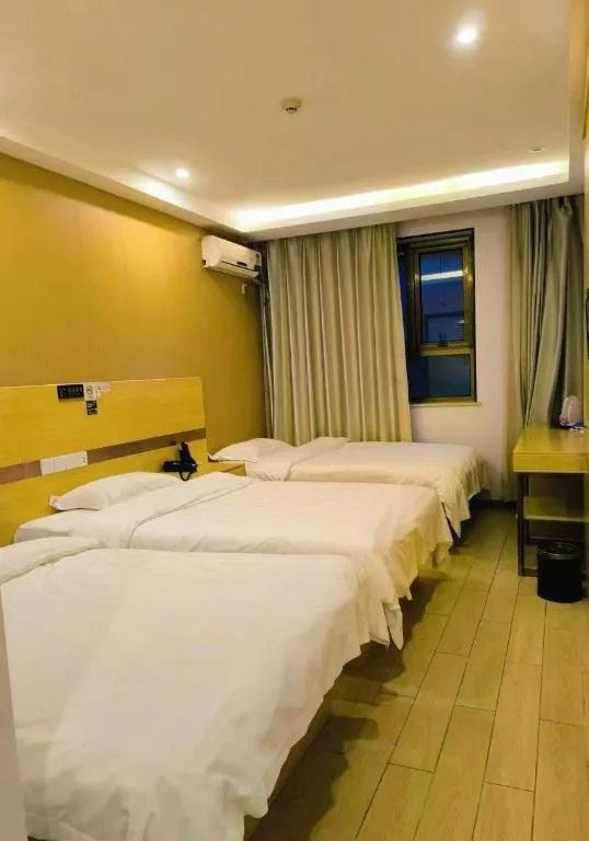 Bed in Shell Hotel Beijing Fangshan District Chengguan Metro Station