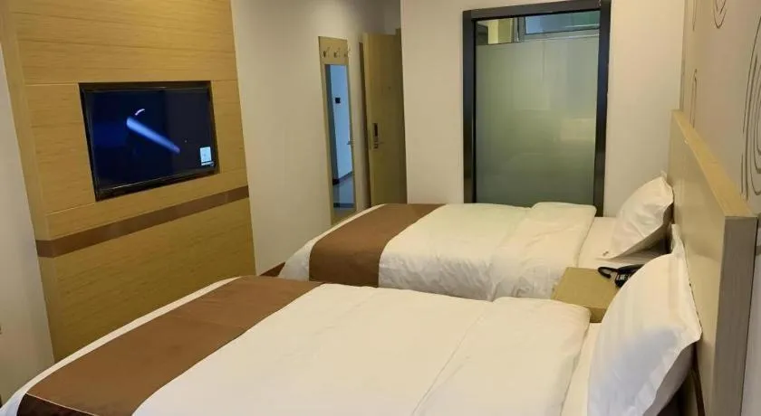 Bed in Shell Hotel Beijing Fangshan District Chengguan Metro Station