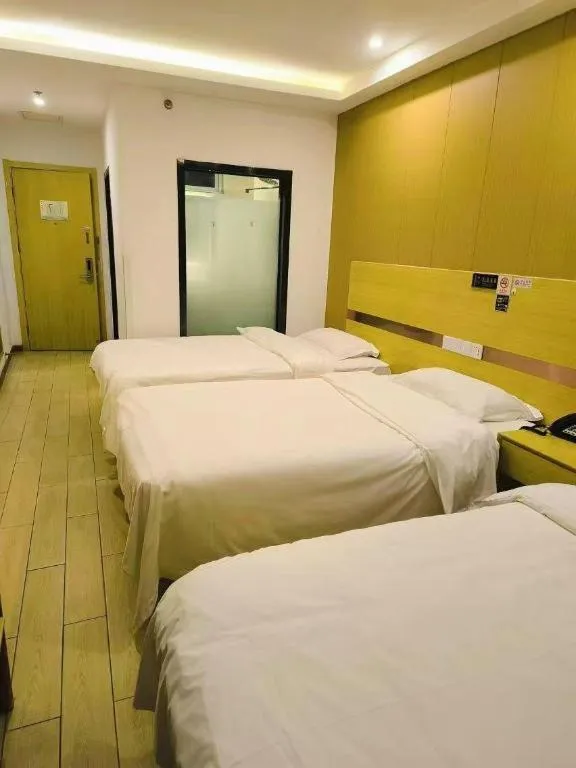 Bed in Shell Hotel Beijing Fangshan District Chengguan Metro Station