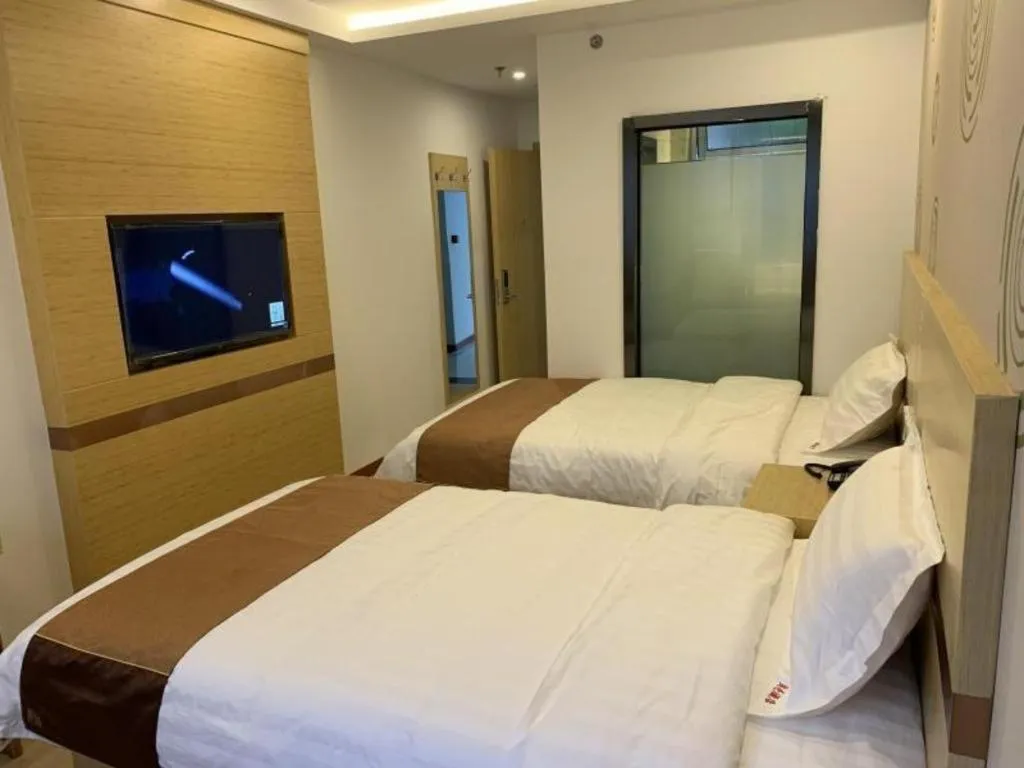Bed in Shell Hotel Beijing Fangshan District Chengguan Metro Station