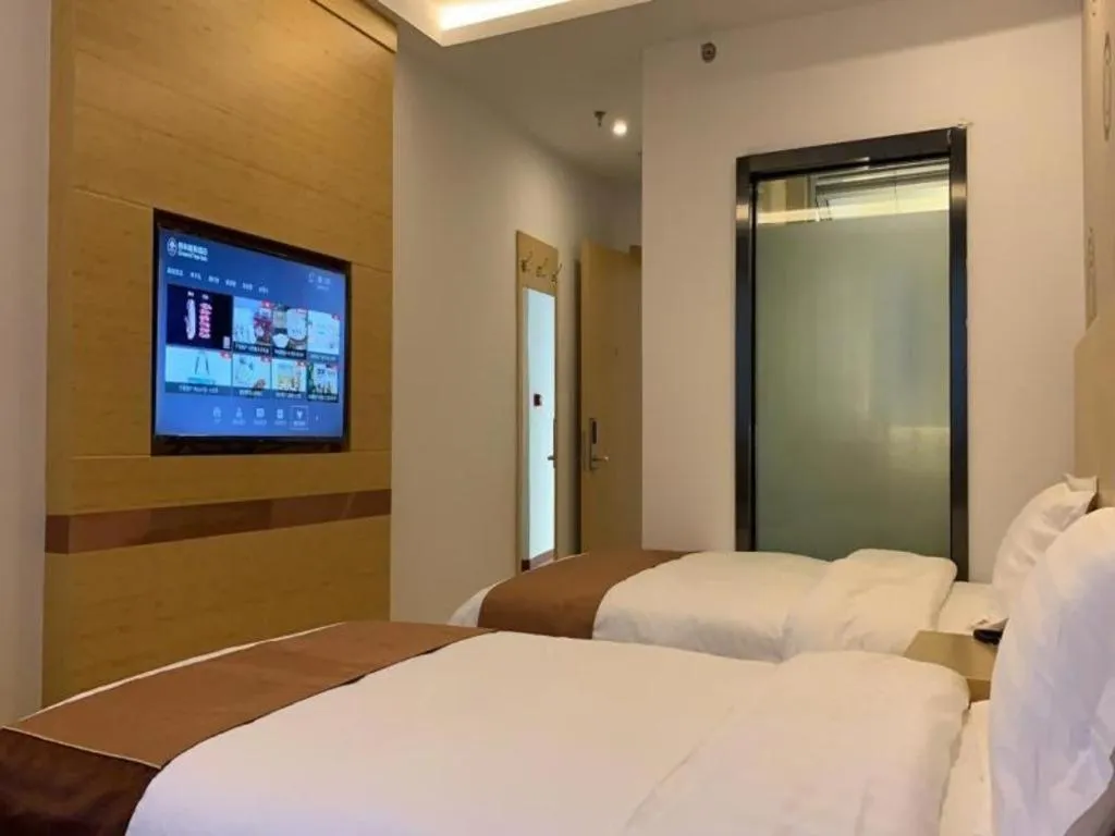 Bed in Shell Hotel Beijing Fangshan District Chengguan Metro Station