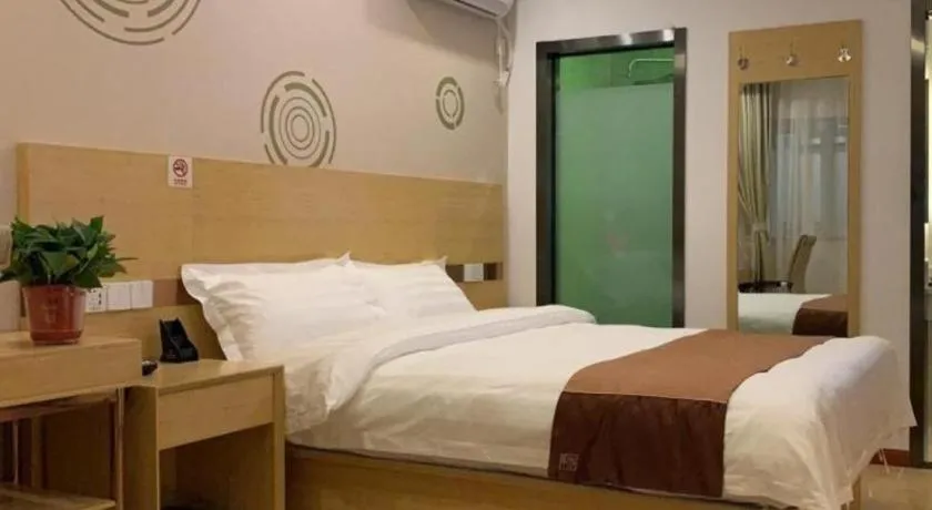 Bed in Shell Hotel Beijing Fangshan District Chengguan Metro Station