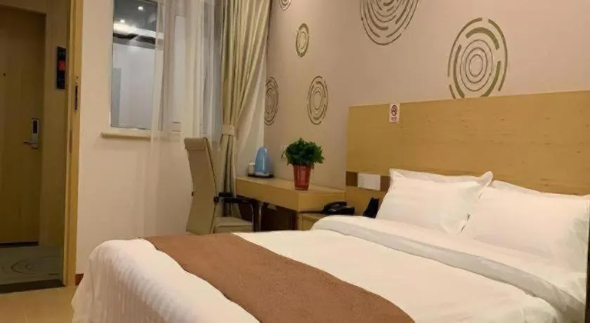 Bed in Shell Hotel Beijing Fangshan District Chengguan Metro Station